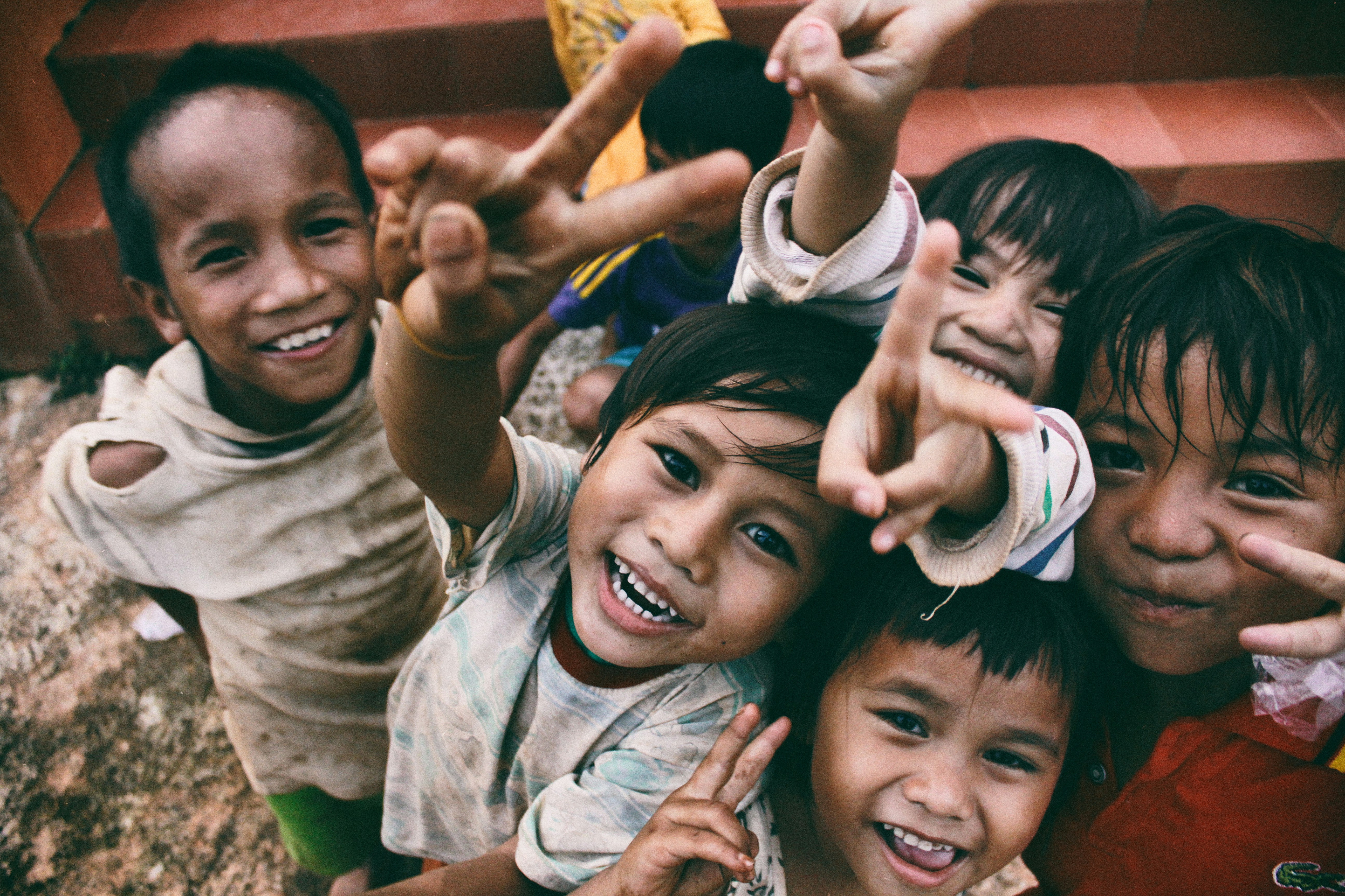 Children smiling together in their community